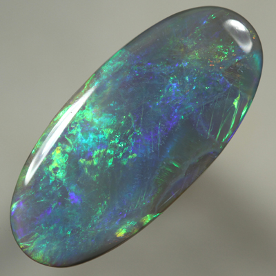 SOLID SEMI BLACK OPAL Large, quality opal with bright rolling flashes. SEE VIDEO